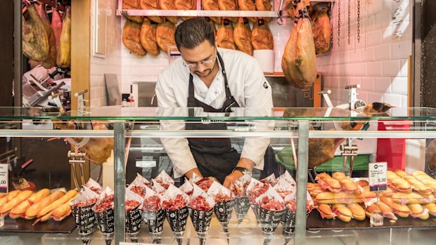 A stand selling Iberico ham in San Miguel Market.