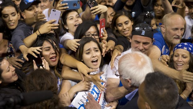 Democratic presidential candidate Bernie Sanders is mobbed in Carson, California on Tuesday.