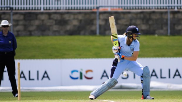 All-round talent: Ellyse Perry hits out for NSW. 
