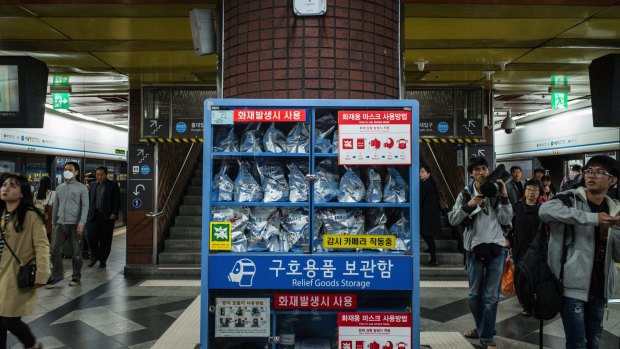 Gas masks in accessible storage at the Seoul Rail Station.