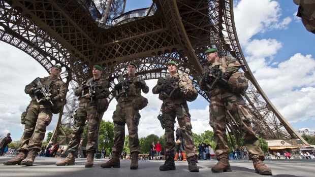 The Eiffel Tower, like other Paris landmarks, has seen a heightened security presence throughout France's state of emergency.