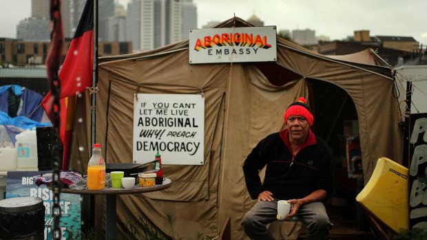 Christopher Tomlins, from Alice Springs, has his morning cup of tea at The Block Tent Embassy in Redfern, Sydney. Christopher is a member of the Freedom Summit for Alice Springs delegation and will remain at the sit-in until "something positive that comes out of this standoff".