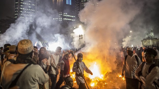 Muslim demonstrators march in Central Jakarta on November 4.