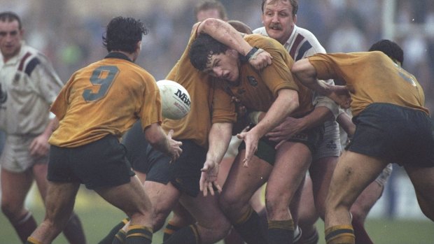 Nemesis: Tim Gavin (centre) releases the ball during the Wallabies’ match against Swansea in Swansea in 1992.