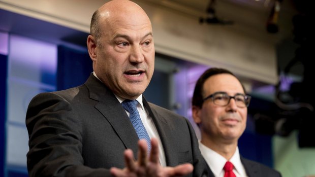 Gary Cohn, right, and Steve Mnuchin said they expected tax legislation to move through congressional committees in the autumn.
