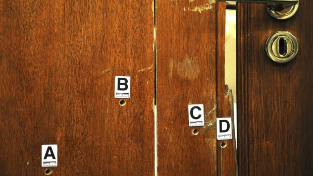 The door through which Reeva Steenkamp was shot is displayed during Oscar Pistorius' murder trial.