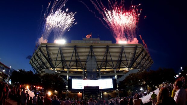 All the glitz: Fireworks explode over Arthur Ashe Stadium ahead of last year's event.