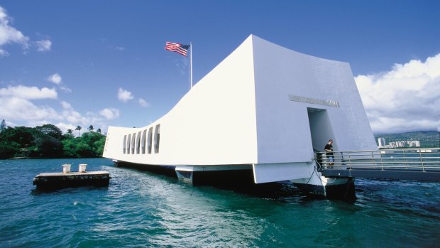 The memorial straddles the sunken hull of the battleship USS Arizona and commemorates the 1941 Japanese attack on Pearl Harbor. 