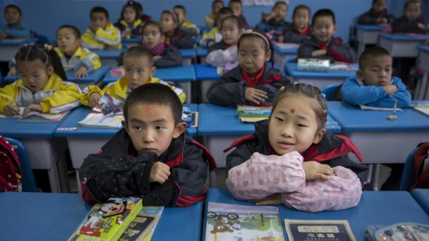 Children at a primary school in Qapqal, China.