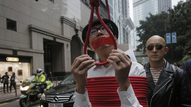 One of the many protests in Hong Kong, highlighting the region's concern regarding the disappearance of five publisher/booksellers. 