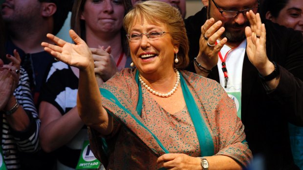 Tortured: Chilean President Michelle Bachelet during a victory rally in Santiago.