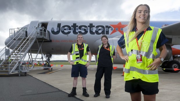 Taylah Smith (right) with fellow Jetstar engineering apprentices Maddy Candy and Ashley Crequer.