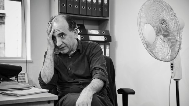 Armando Iannucci in his office. “He has the marginal quality of the slight outsider: the best comics need to feel slightly bullied,” says a writing partner, David Schneider. 