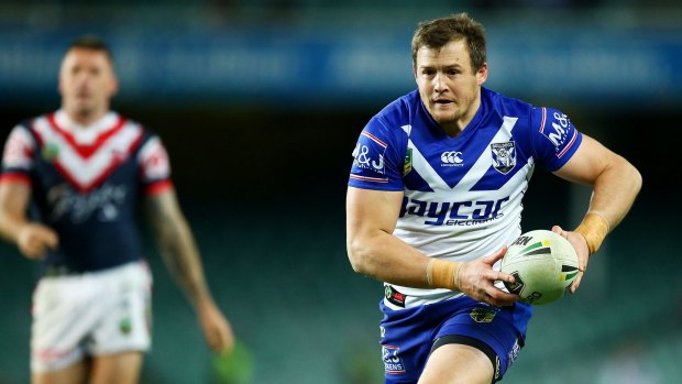Twin tormentors: Josh Morris runs the ball during the round 17 NRL match between the Sydney Roosters and the Canterbury Bulldogs at Allianz Stadium.