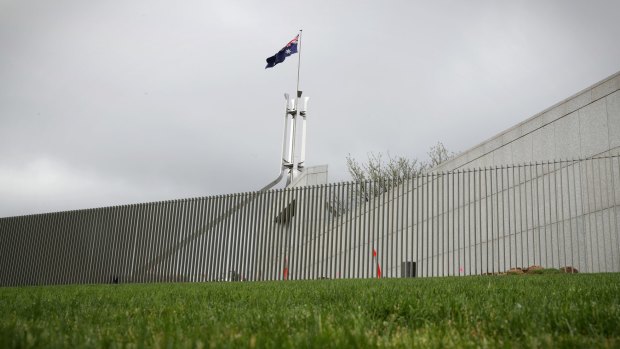 Not-so-splendid isolation: The security fence at Parliament House.