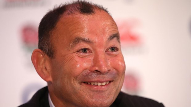 All smiles: Eddie Jones, the new England Rugby head coach, faces the media at Twickenham Stadium.