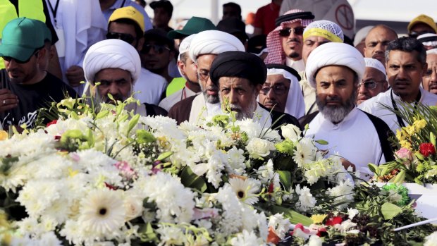 Shiite clerics at the funeral of the Dammam bombing victims.