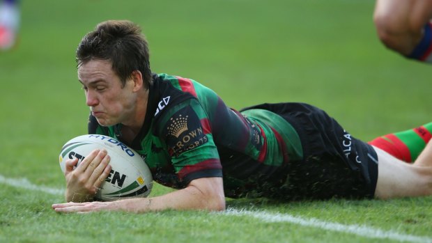 Sliding in: Souths playmaker Luke Keary is in the sights of the Dragons.