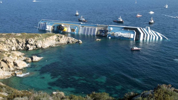January 2012: the luxury cruise ship Costa Concordia leans on its side after running aground on the tiny Tuscan island of Giglio. Thirty-two people died in the accident.