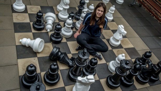 Female chess player Saffron Archer. Players are equal when the game begins but girls and women comprise only 15 per cent of tournament chess players in Australia.