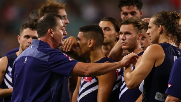 Pep talk: Ross Lyon tries to rally his troops at three-quarter-time.