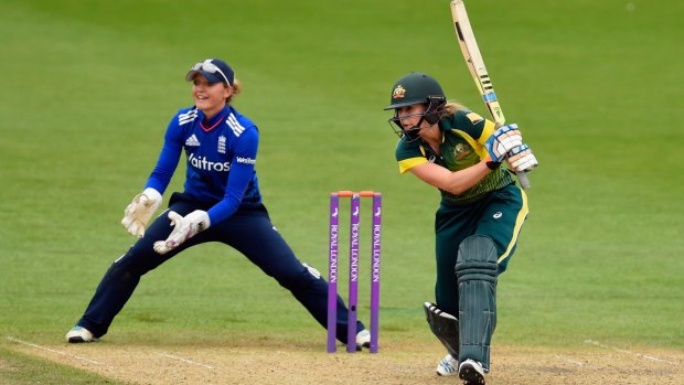 Stylish: Ellyse Perry strokes the ball through the off-side.