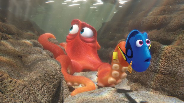 Dory (Ellen DeGeneres) a forgetful regal blue tang fish, right, embarks on her own personal quest to find her parents in <i>Finding Dory</I>.