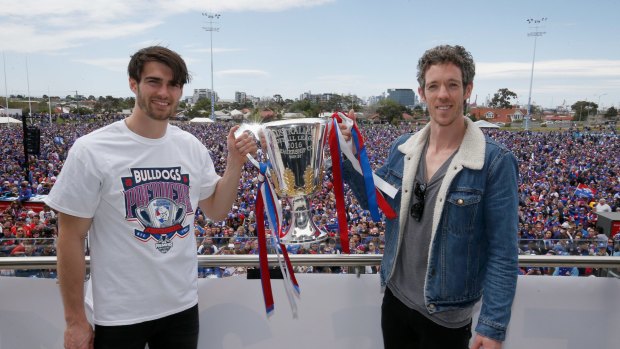 Easton Wood and Bob Murphy (right) pose with the 2017 premiership cup. 
