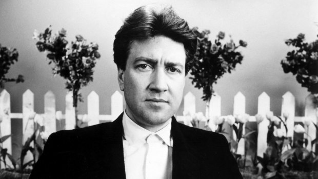 David Lynch during the making of <i>Blue Velvet</i> in 1986. Like much of his work, it explored the dark side of suburbia.