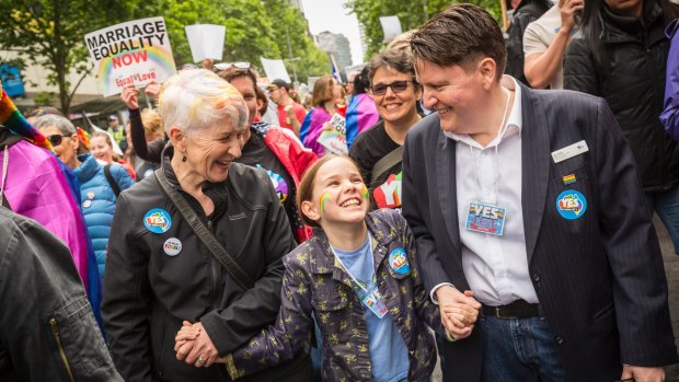 Victorian Commissioner for Gender and Sexuality Ro Allen (right), her partner Kaye Bradshaw and their daughter, Alex Bradshaw-Allen, 9, turned out in support of the same-sex marriage ''yes'' vote in an Equal Love rally through Melbourne's CBD on Sunday. 