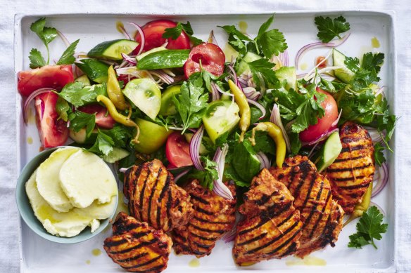 Garlicky grilled chicken with a simple salad.