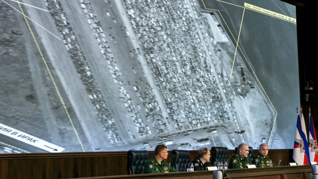 Russian Defense Ministry officials reveal to hundreds of journalists what they said were satellite and aerial images of thousands of oil trucks streaming from the IS-controlled deposits in Syria and Iraq into Turkish sea ports and refineries.