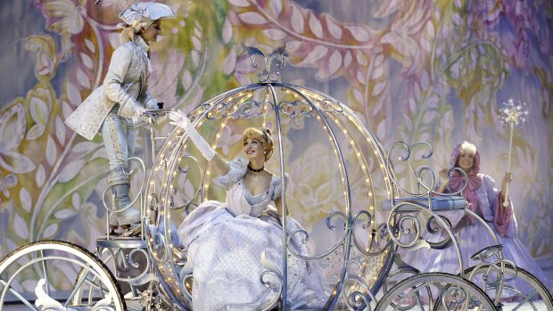 Cinderella arrives in her coach in Disney on Ice.