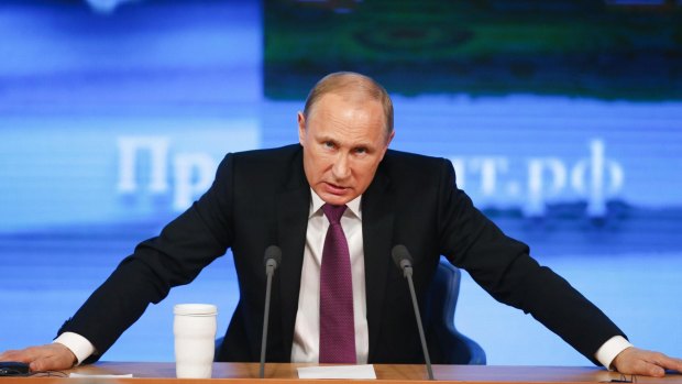 Troubled times: Russian President Vladimir Putin speaks at his annual end-of-year news conference in Moscow.