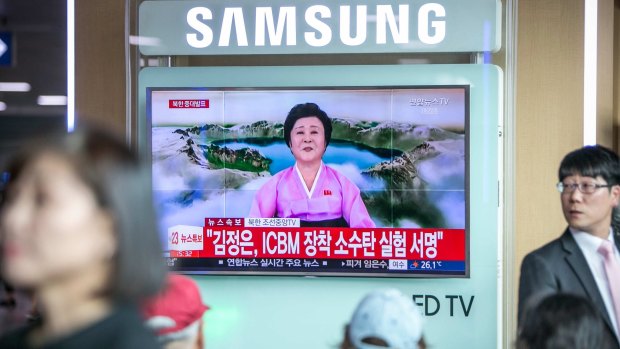 Ri Chun-hee's broadcast on North Korea's nuclear test is played in Seoul on Sunday.
