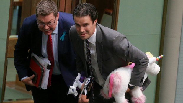 Labor MPs Pat Conroy and Tim Watts leave under 94a after taunting Treasurer Scott Morrison with a toy unicorn during question time. 