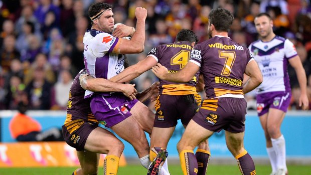 One-way traffic: Dale Finucane drives forward against Brisbane. 