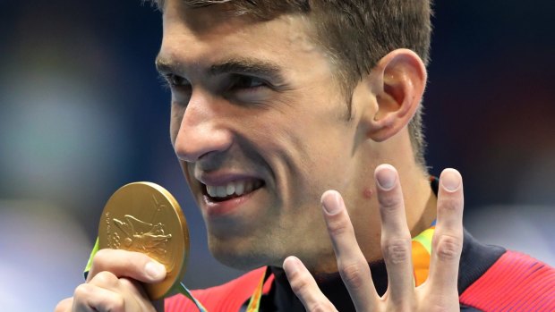 Michael Phelps' success was powered by hip-hop.