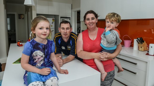 Hollie Adamson with her husband Declan Sheehan and children James and Clodagh in their Concord home. The family does not want to sell, but is being besieged by offers. 