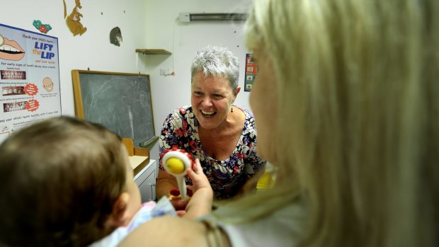 Child and family health nurse Sue Colville  with clients at the Hornsby Early Childhood Centre, Hornsby, Sydney.