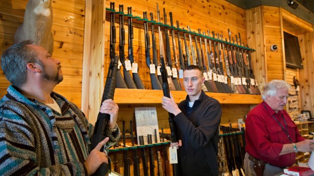 Customers crowd the Huron Valley Guns store on Gun Appreciation Day. 