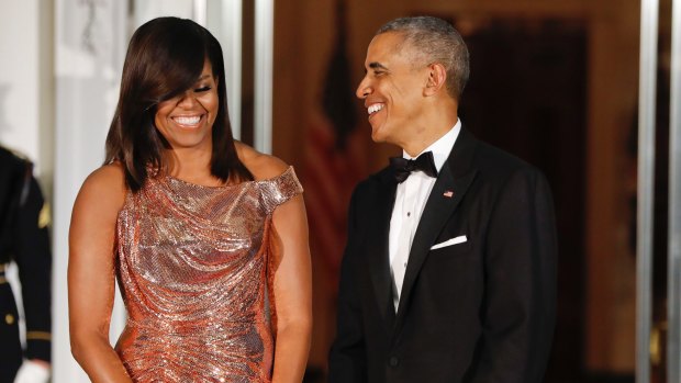 Popular progressive figures: Barack and Michelle Obama.