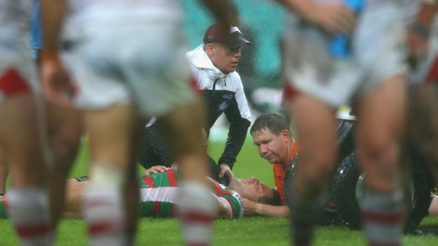 Scary scenes: Sam Burgess receives treatment at the SCG.