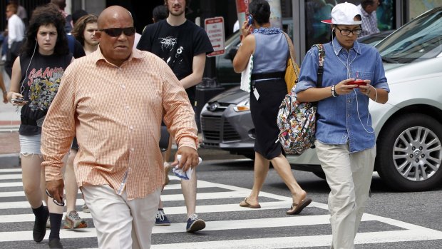 A New Jersey lawmaker is targeting distracted walking. The proposed measure would ban walking while texting and bar pedestrians on public roads from using electronic devices unless they are hands-free. 