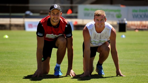 On your marks: Collingwood defender Ben Reid and 2012 Stawell Gift winner Matthew Willis in Stawell on Tuesday.