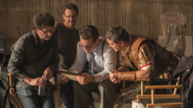 Joel and Ethan Coen on the set of <i>Hail, Caesar!</i> with Josh Brolin and George Clooney.