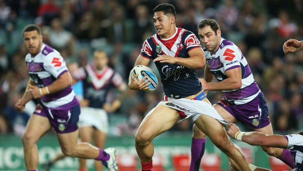 Out of comfort zone: Roger Tuivasa-Sheck runs the ball during the NRL qualifying final match between the Sydney Roosters and the Melbourne Storm at Allianz Stadium.