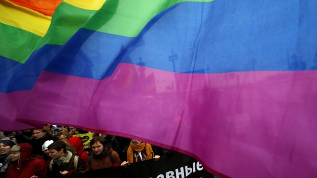 Gay rights activists take part in a march through St Petersburg earlier this month.