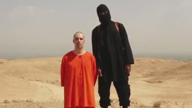 This undated image shows a frame from a video released by Islamic State militants Tuesday, 19 August, 2014, that purports to show the killing of journalist James Foley by the militant group. 