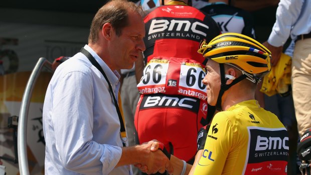 Tour de France race director Christian Prudhomme with Rohan Dennis before the start of stage two in Utrecht.